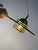 This pendant lamp, crafted from smoked glass and brass by Jan Eskil Eskilsson for the renowned Swedish manufacturer Belid,...