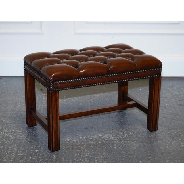 Gorgeous Vintage Georgian Style Hand Dyed Leather Tufted Footstool. A very good-looking and well-made stool, it has been...