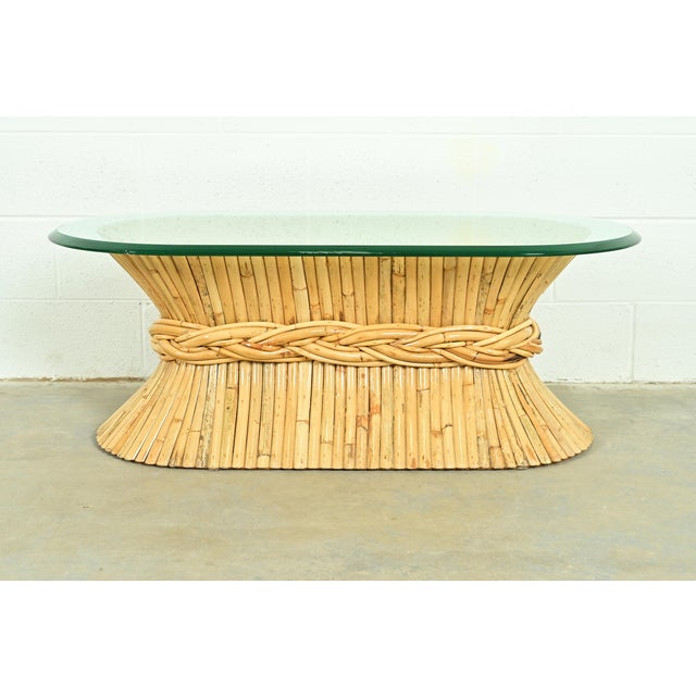 A gorgeous mid-century Hollywood Regency Organic Modern pedestal coffee table By McGuire of San Francisco USA, Circa 1970s...