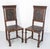 Pair of oak and leather chairs, Middle East Embossed leather The leather has marks of use but it it uin good condition....
