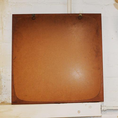 A mid-century danish teak mirror by clark eaton made from teak and produced in the 1960s. designer: clark eaton design...