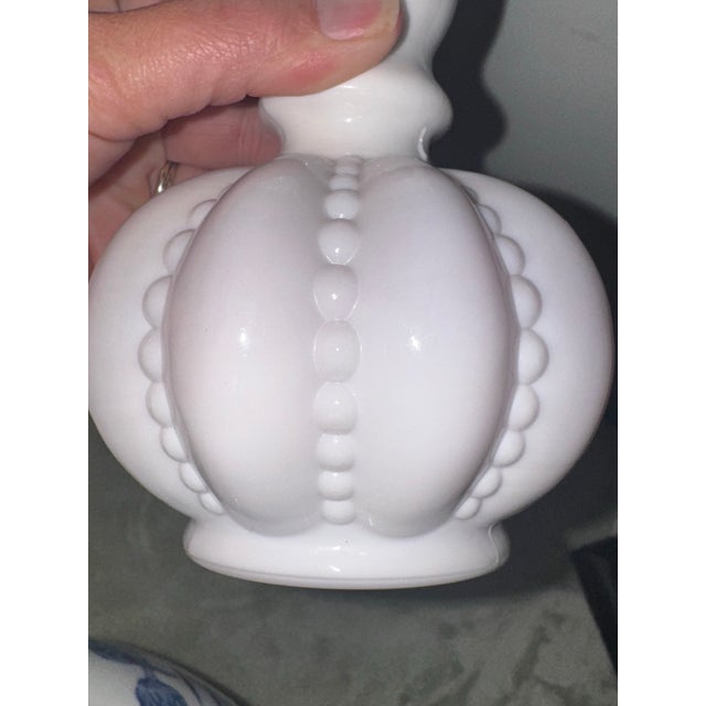 7 1/2” tall 4 1/2” wide. Beautiful vase. Color is more of a pink melon.