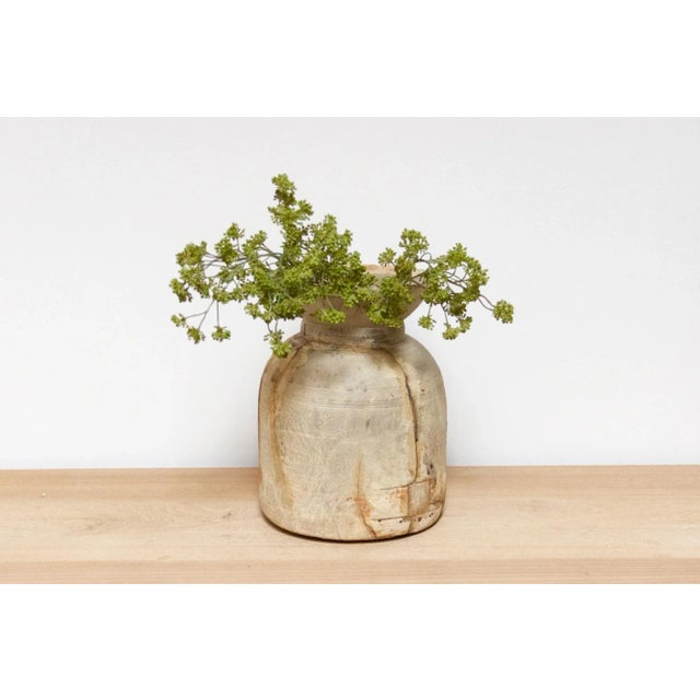 This charming antique carved wood pot was crafted from teak and originally used in Village kitchens in North India to...