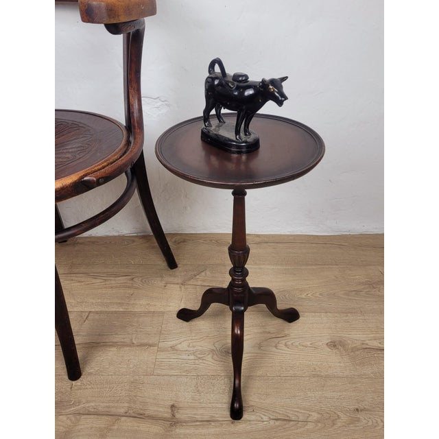 This is an elegantly carved wine table that boasts beautiful 19th-century features, with a classic and timeless Victorian...