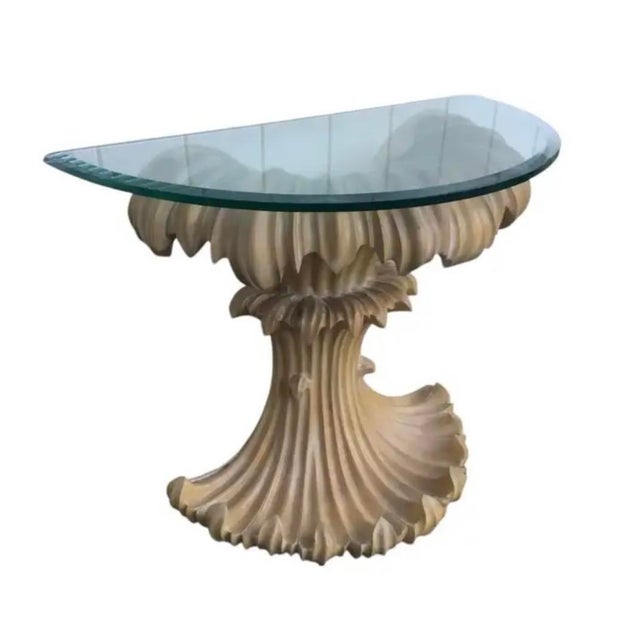 Mid-century Italian Sculptural Wood Console Table. The base is hand-carved natural wood with deeply fluted, shell-like...