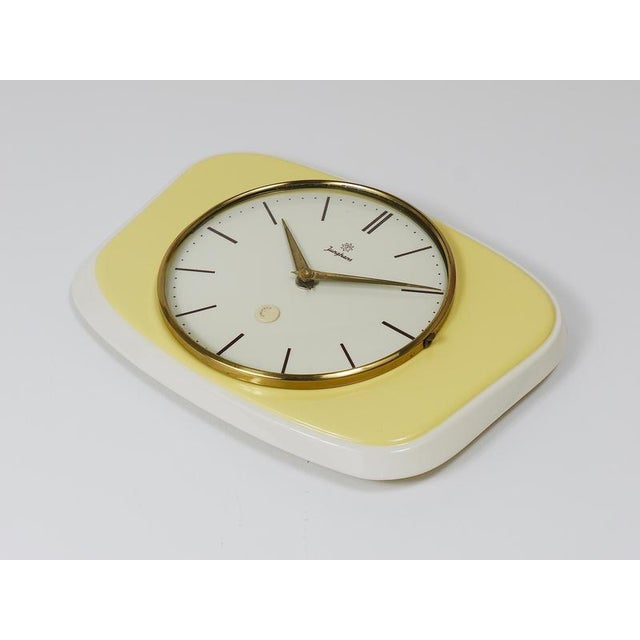 Mid-Century Modern Pastel Yellow Midcentury Wall Clock in the style of Max Bill from Junghans, Germany, 1950s For Sale - Image 3 of 12
