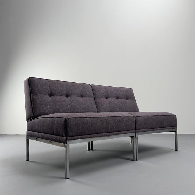 A timelessly simple pair of armchairs, designed by Johannes Spalt for Wittmann, Vienna 1960. The armchairs were completely...