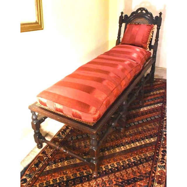 English Baroque caned seat day bed, late 17th or early18th century. As the style would dictate, the cresting of the...