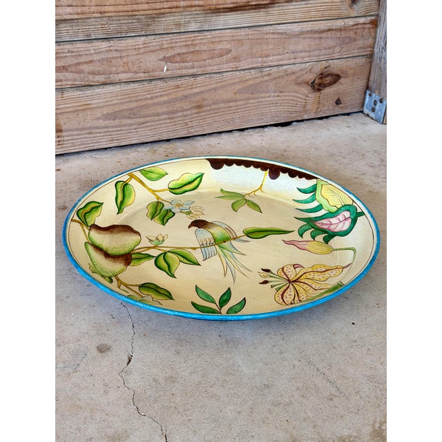 Charming vintage hand-painted papier-mâché tray featuring a tropical bird perched among lush botanical foliage and...