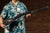 Hand-carved wooden figural gun trade sign with original iron hanging mounts. Measuring over three feet in length, this...