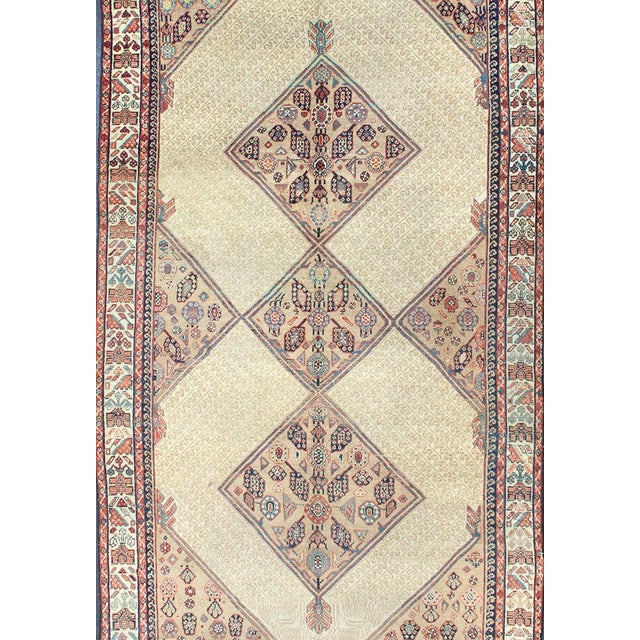 Measures: 5'4 x 11'9. Antique Persian Serab Gallery Runner with Camelhair Field and Geometric Motifs. Keivan Woven Arts/...
