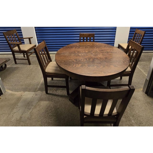 This Arts & Crafts-style solid oak dining room set, was made by J. K. Rishel Company of Williamsport and Hughesville,...