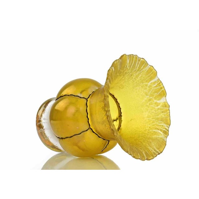 Early 20th-century iridescent caged glass vase. Signed with acid on the bottom "Alde". Visible crack in the center of the...
