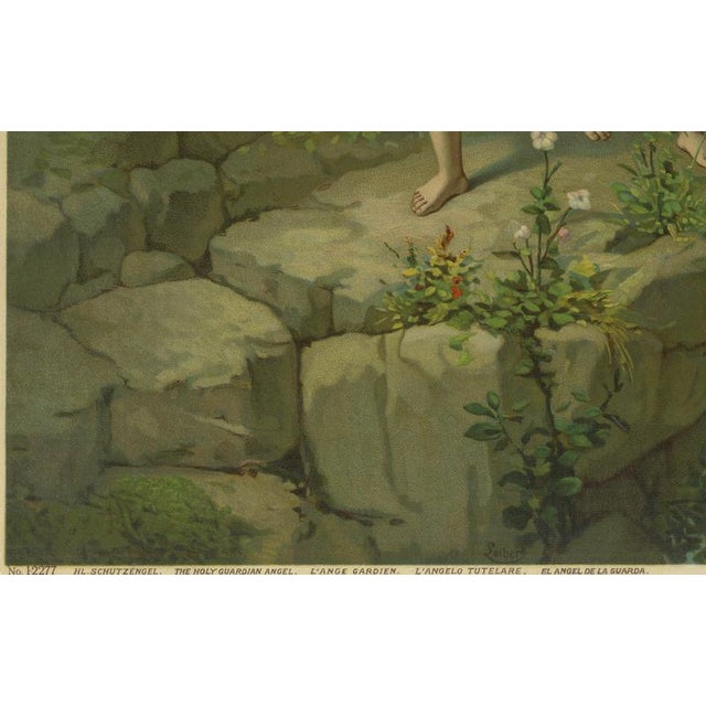 This touching late 19th–early 20th century German chromolithograph depicts a classic Catholic devotional scene of a...