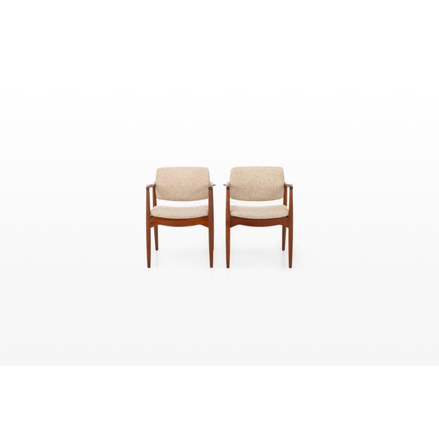 Pair of Captain's chairs designed by Erik Buch for Ørum Møbler, Denmark 1960s. These beautiful armchairs are made of teak...