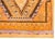 A brilliant vintage mid-20th century Moroccan rug with a central stylized floral diamond surrounded by repeated petite...