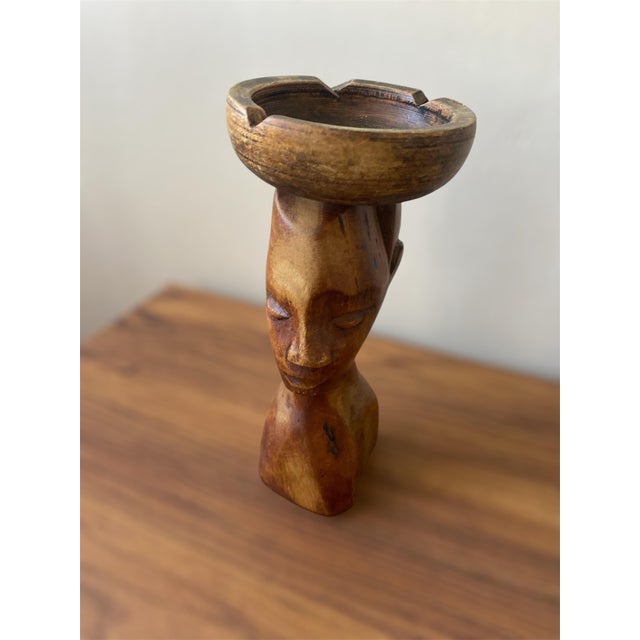 Vintage Hand-Carved Wooden Figurine Africa. Condition: great pre-owned. It appears to also function as an ashtray....