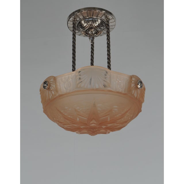 H. Petitot & Muller freres A nice1930 French art deco chandelier by Petitot with a large bowl by the glass factory of...