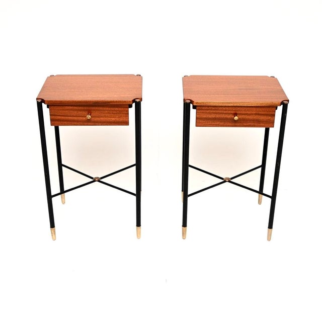A very stylish and extremely well made pair of vintage French side tables. They are in the manner of Jacques Adnet, they...