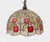 A decorative stained glass pendant chandelier, in the Tiffany revival taste of the mid-20th Century, featuring a domed...