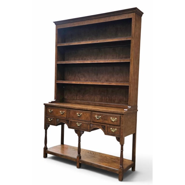 Baker Furniture Company Late 20th Century Baker Furniture Georgian-Style Carved Oak Welsh Dresser With Open Plate Rack [2-Part], Brass Bail Hardware and Turned Supports For Sale - Image 4 of 15