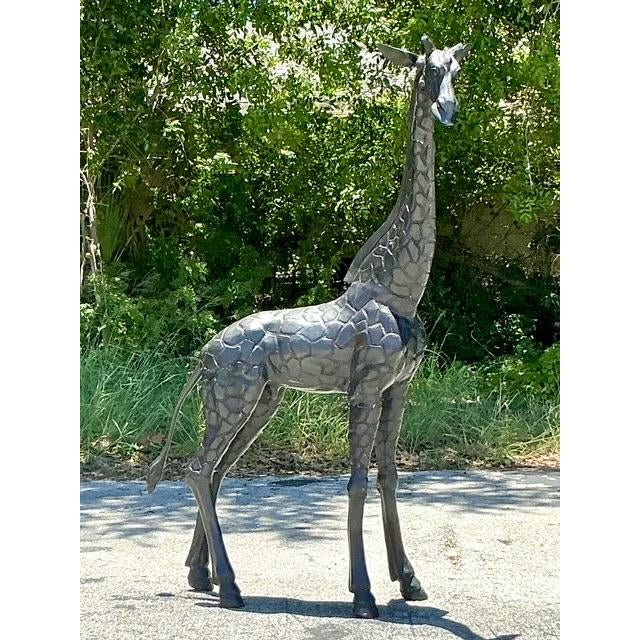 Capture the majestic spirit of the savanna with this monumental vintage giraffe sculpture. Expertly crafted from bronze,...