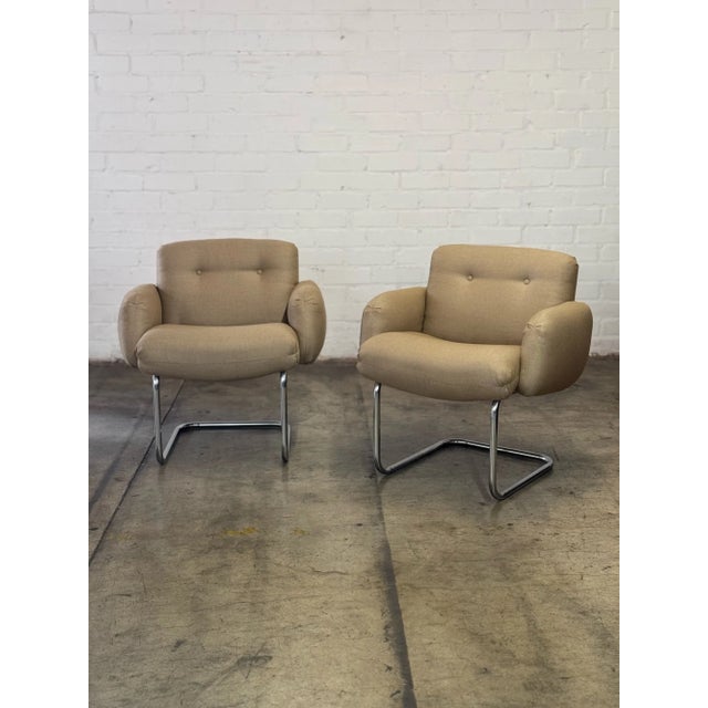 W30 D26 H32 SW22 SD18 SH21 AH26.5 Vintage chrome cantilevered lounge chairs in great condtion. The pair shows to be...