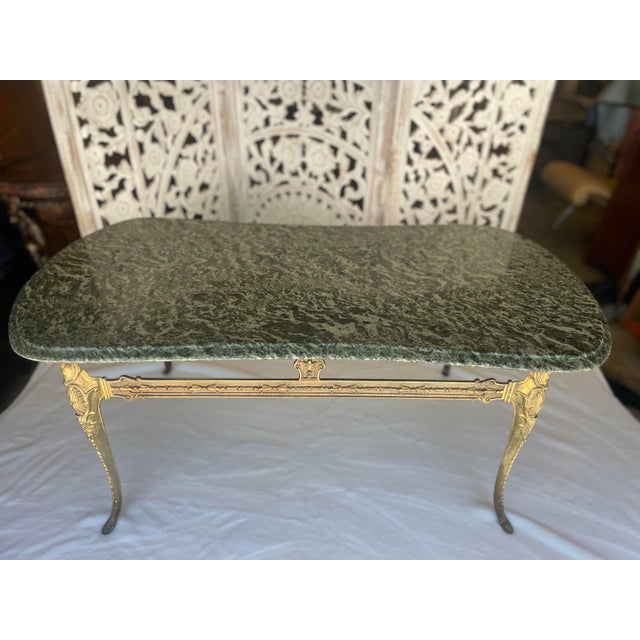 Introducing a stunning vintage treasure: a circa 1950s coded table that embodies the charm and sophistication of classic...