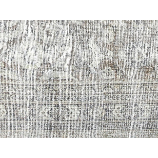 This authentic Semi Antique Persian Mahal Rug is a beautiful piece of craftsmanship, featuring a wool-on-cotton...