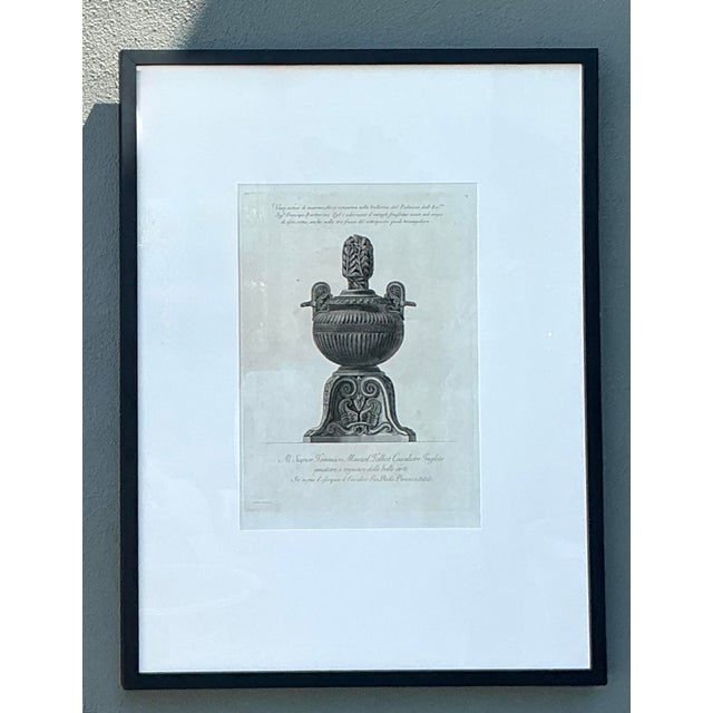 This monumental framed print, after the legendary Giovanni Battista Piranesi, celebrates the grandeur of Roman antiquity...