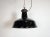 Industrial black enamel pendant light made by Elektrosvit in former Czechoslovakia during the 1950s. White enamel inside...