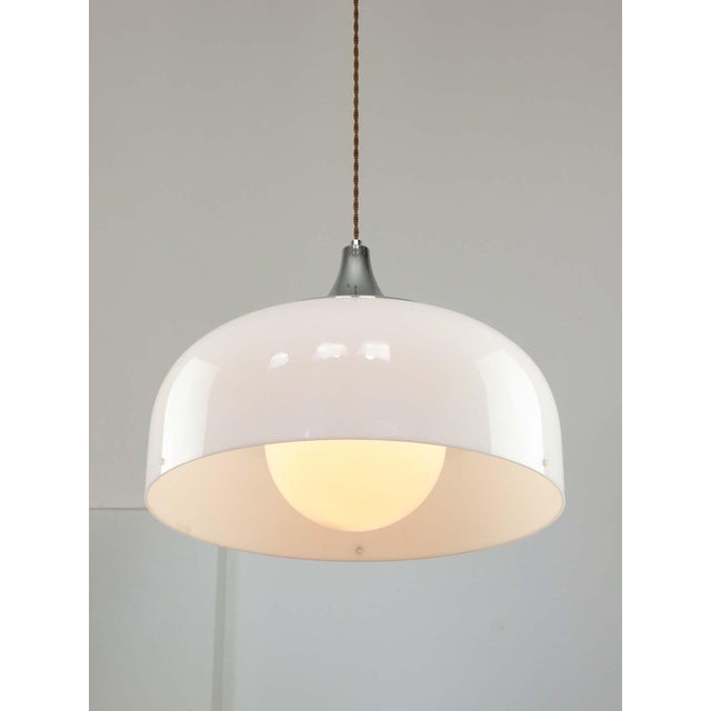 Diameter of this lamp is a whopping 45cm compared to the 35cm smaller more widespread model (orange in the photo with the...