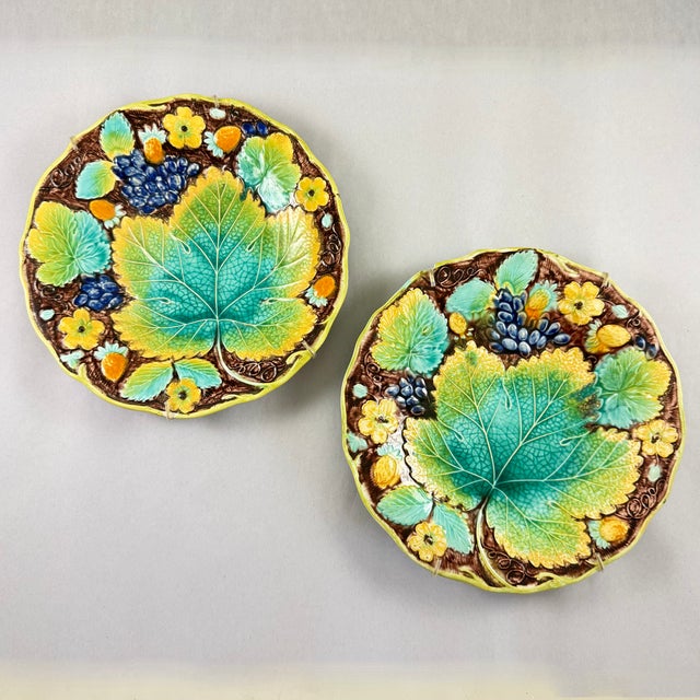 A set of two strawberry and grape leaf plates, from Samuel Alcock & Co, Burslem, Staffordshire, England, circa 1850. This...