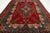 Red This Vintage Handmade Persian Tabriz Wool Rug in a Rich Red With a Rosette Motif For Sale - Image 8 of 10