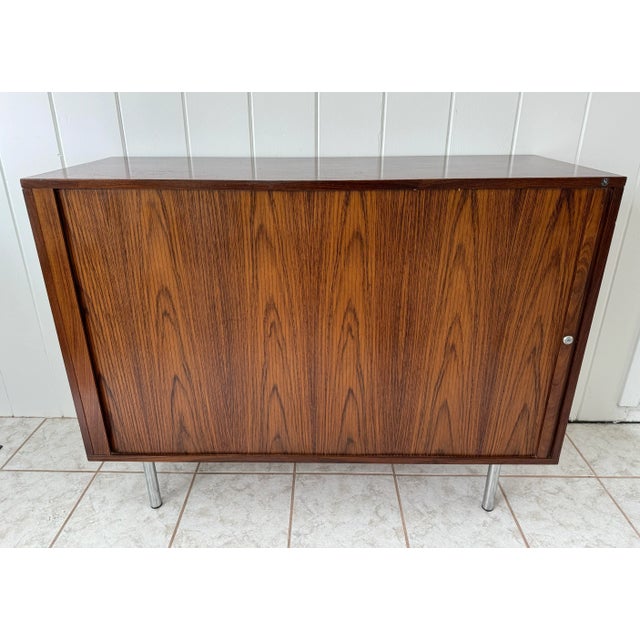 A beautiful vintage Scandinavian modern cabinet in Brazilian rosewood designed by Marius Byrialsen and manufactured by...