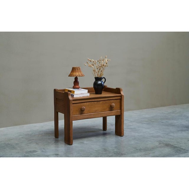 An unusual ‘Kunstmeubelen De Puydt’ cabinet / chest of drawers in solid oak. Belgium, 1960s. A rather interesting cabinet,...