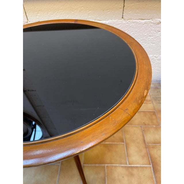 Italian mid century wood, black opaline glass top coffee low cocktail table or gueridon attributed to cesare Lacca. In the...