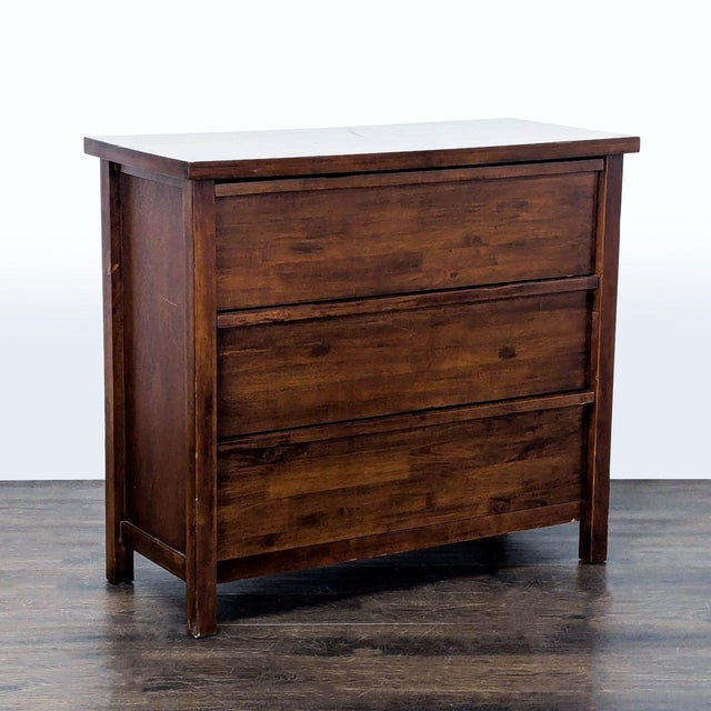 This dresser features three spacious drawers, perfect for storing clothes, linens, or other items. The simple and timeless...