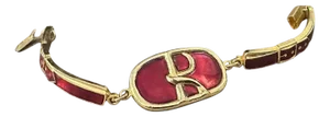 An Iconic 1990s Brass and Red Enamel Bracelet by Roberta Di Camerino