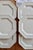 Elegant set of six white earthenware dessert plates by Johnson Brothers. Octagonal shape with a raised, beaded rim; clean...