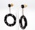 The Iris Fine Jewelry earrings are a striking creation featuring black onyx as the primary stone. Embellished with...