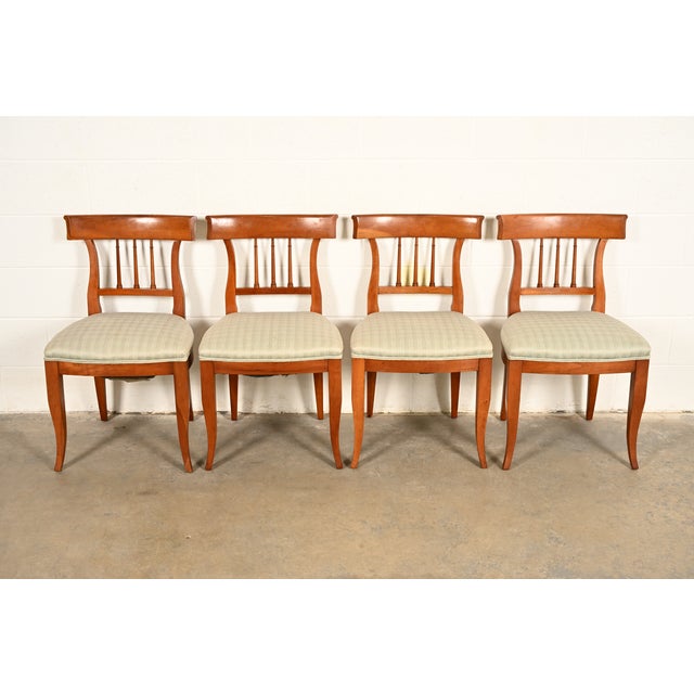 An outstanding set of four Regency or Neoclassical style Klismos dining chairs By Kindel Furniture USA, Circa 1980s Solid...