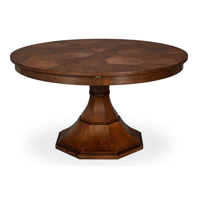 Honeyed oak and a many-sided base give the circular form warmth and architectural weight. The round top expands from 55 to...