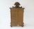 Stunning German antique cabinet from the early 1900's with many carved ornaments overall. It has a door with a unique...