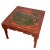 The table shown in the images have traditional Chinese design elements. It features a red lacquer finish, intricate hand-...