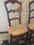 These Vintage French Provincial Chairs are beautifully crafted. Made with a wood frame and featuring a high ladder back...