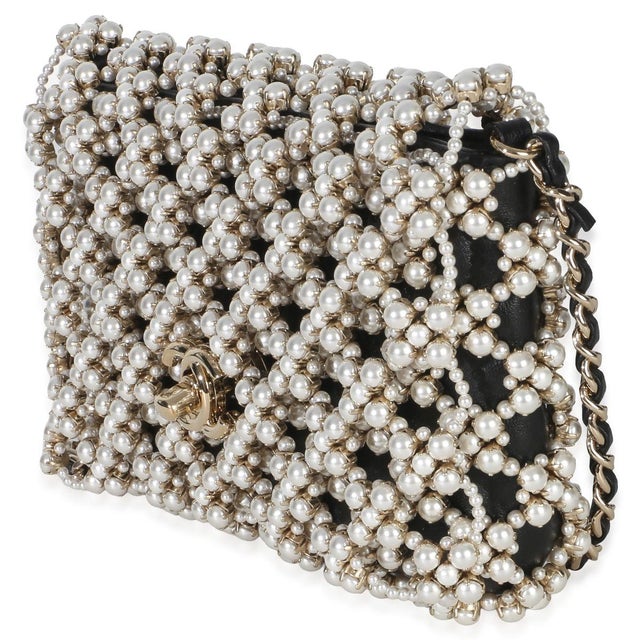 Item #: 151127 Interior Material: Leather Size: MIni Features Interior: One slip pocket Dimensions: 7.5 x 5 x 1.5 in...