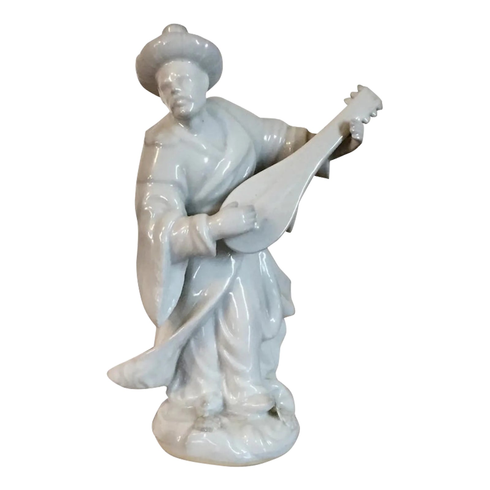 Continental Blanc De Chine White Porcelain Malabar Figure of a Chinese Musician or Mandarin