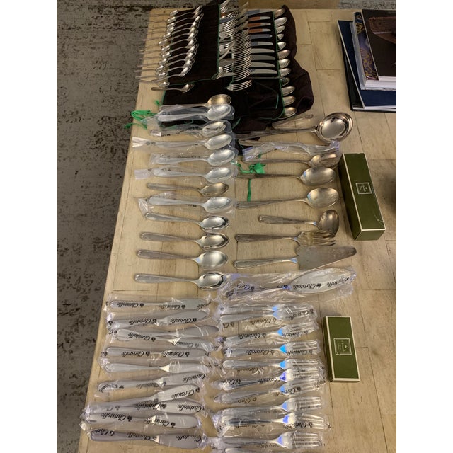 Some items still new in bag 12 Dinner Forks 12 Salad Forks 12 Fish Forks 12 Tea Spoons 11 Coffee Spoons 12 Soup Spoons 12...