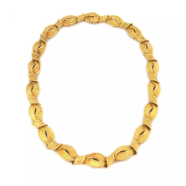 This gorgeous authentic vintage collar necklace is from Tiffany & Co. Crafted from 18k yellow gold featuring wide ribbon...
